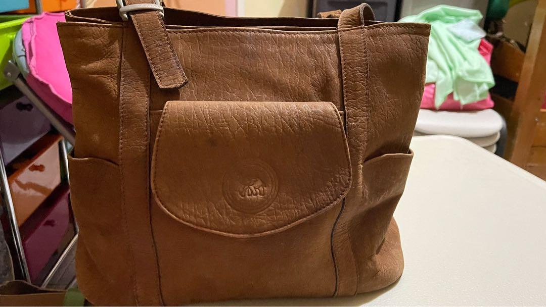 Authentic leather bag made in Thailand (Category: Shoulder Bags) located in Makati City. Submitted by kuking (Listing ID 1173106003, Image 1). Description: Authentic leather bag from Thailand Only issue metal hardware needs polishing.