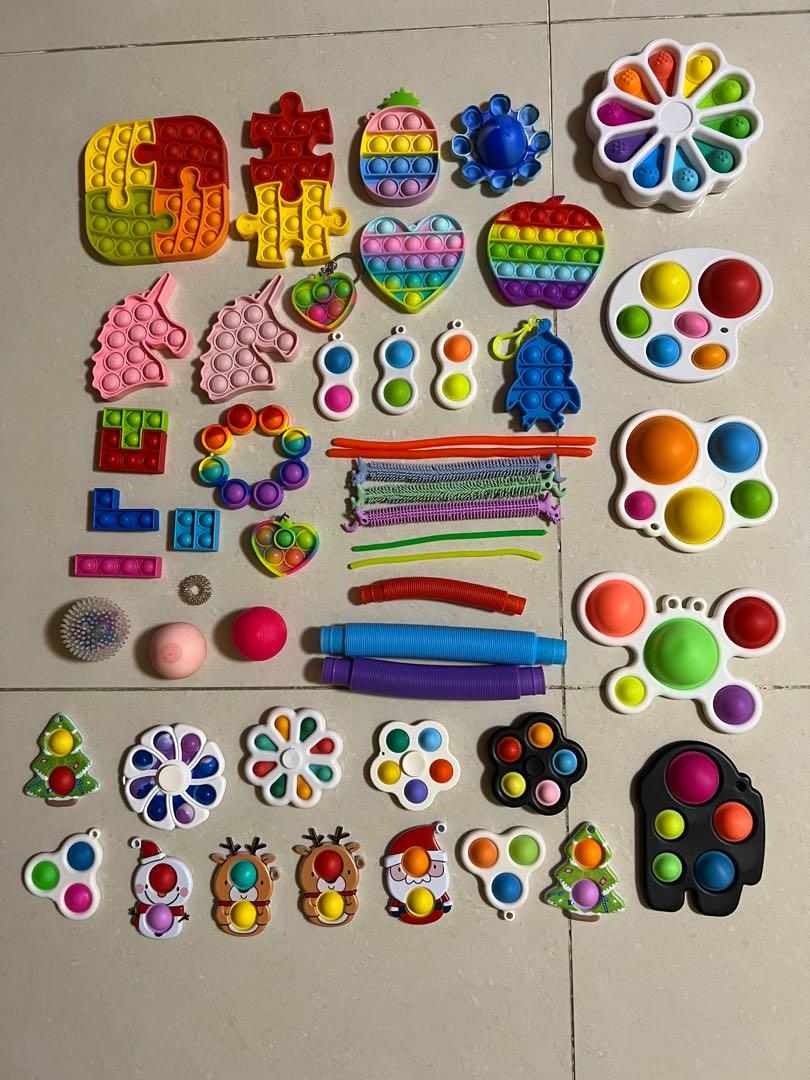 CLEARANCE free mailing! Fidget toys children sensory play rainbow heart apple unicorn Christmas among us dimples jigsaw Pop it’s, fidget spinners, pop tubes, dimples, monkey noodles, squish balls (Category: Kids Toys) located in Singapore. Submitted by hspc2005 (Listing ID 1173114679, Image 2). Description: Updated: May 2023 Dm for prices of each item Free mailing Will give freebies :).