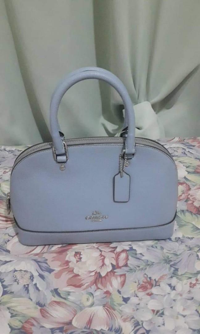 Coach Sling bag and wallet (Category: Luxury Bags & Wallets) located in Pasig City. Submitted by DearStephscloset (Listing ID 1173110811, Image 2). Description: Coach Sling bag and wallet.