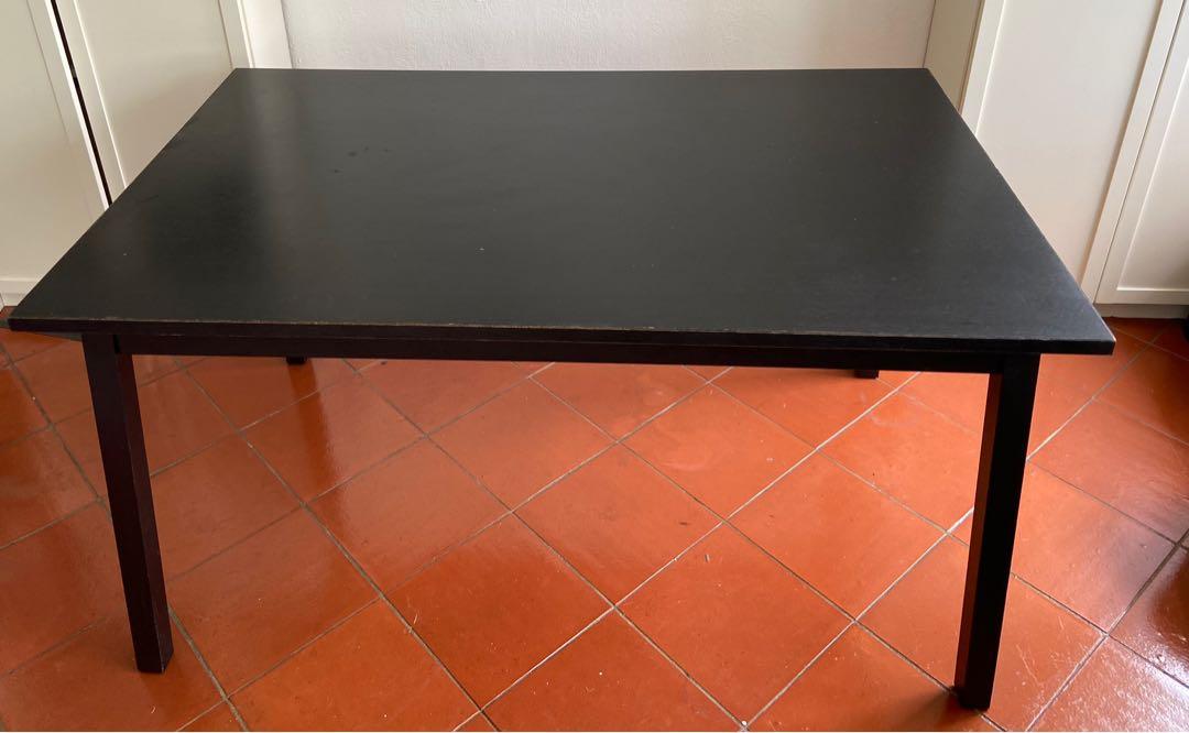 Dining table / study table - extendable (Category: Tables & Sets) located in Singapore. Submitted by monisha.varadan (Listing ID 1173036105, Image 1). Description: Black table 143/203 (W) x 90 (D) x 70 (H). Very sturdy .
