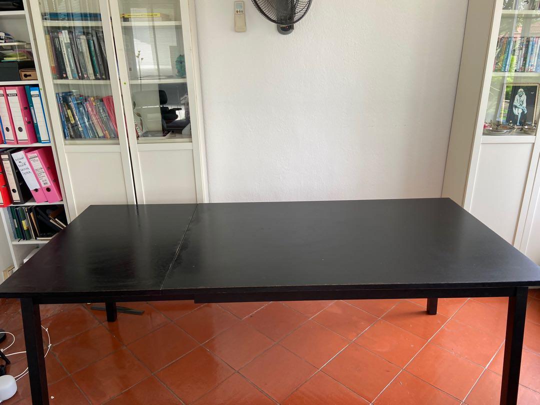 Dining table / study table - extendable (Category: Tables & Sets) located in Singapore. Submitted by monisha.varadan (Listing ID 1173036105, Image 2). Description: Black table 143/203 (W) x 90 (D) x 70 (H). Very sturdy .