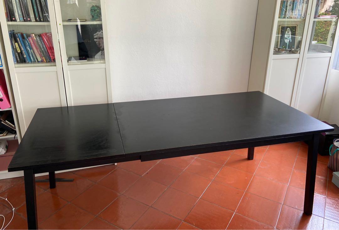 Dining table / study table - extendable (Category: Tables & Sets) located in Singapore. Submitted by monisha.varadan (Listing ID 1173036105, Image 3). Description: Black table 143/203 (W) x 90 (D) x 70 (H). Very sturdy .