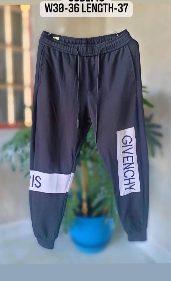 GIVENCHY Track pants with tuxedo stripes in black