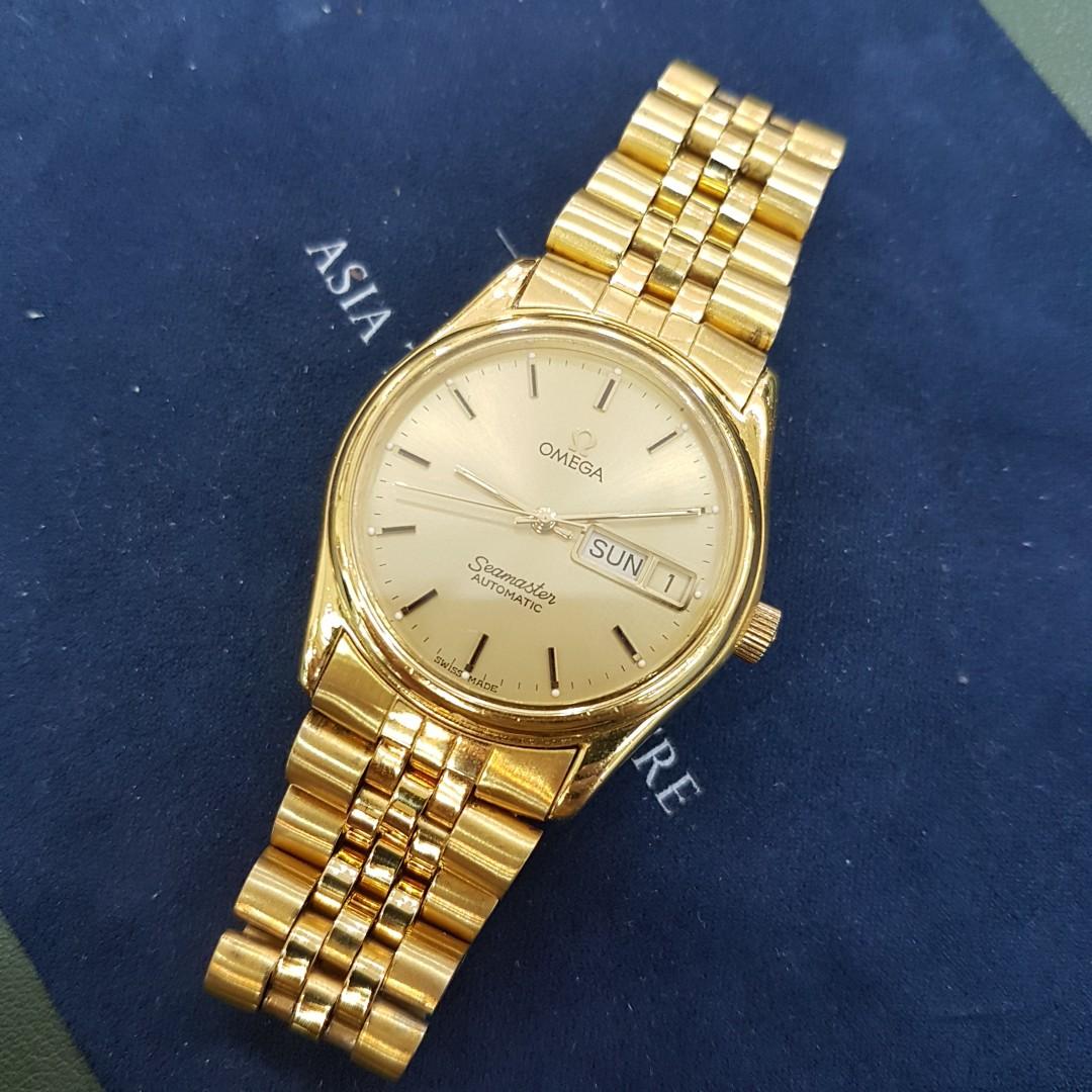 omega seamaster gold day date