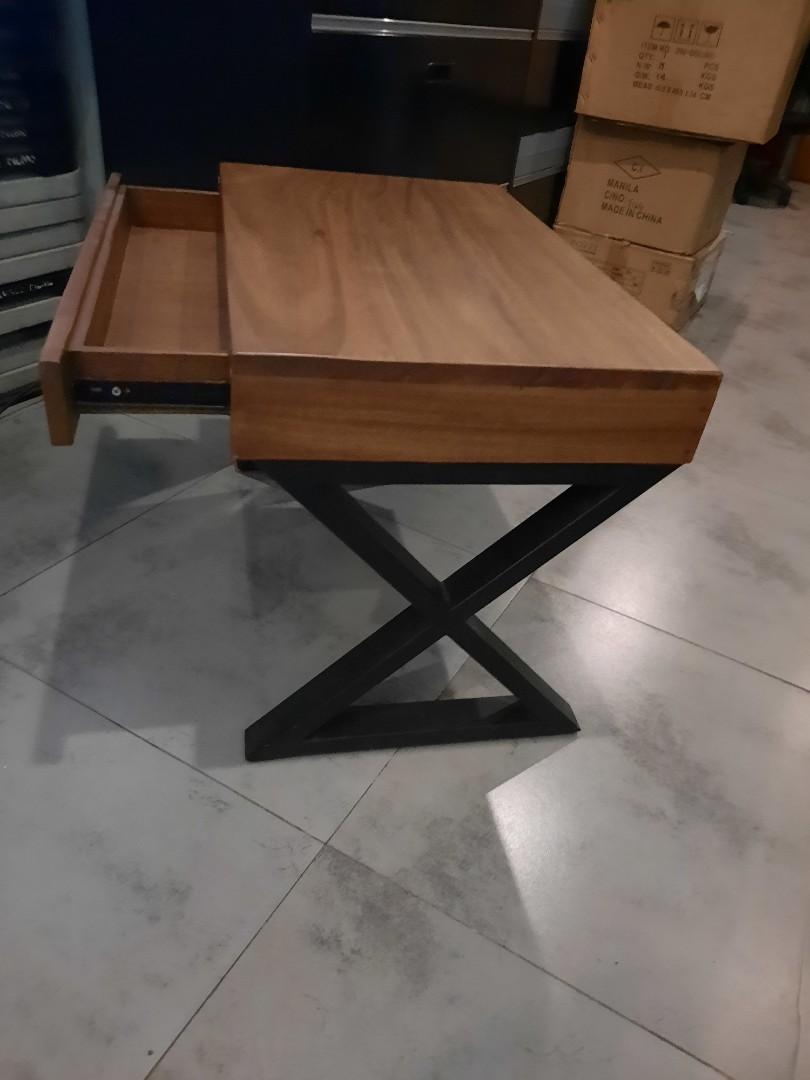 Wood side table with steel legs (Category: Tables & Sets) located in Makati City. Submitted by 88acres (Listing ID 1173205718, Image 3). Description: Wood top with drawer Steel legs length 29 in width 17.75 in height 20 in.