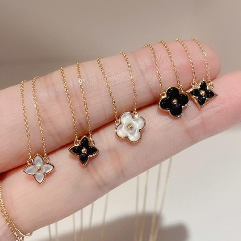 Gold flower hotsell necklace