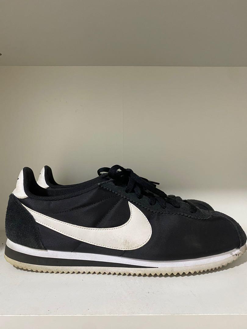Black canvas nike cortez discount