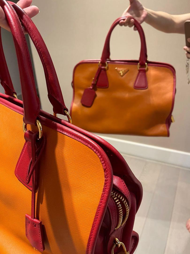 Prada Leather Bag (Category: Luxury Bags & Wallets) located in Makati City. Submitted by kl080808 (Listing ID 1173495843, Image 3). Description: The Prada Papaya (with red accent) in Saffiano Leather Dome Bag BN2575 is one chic and luxurious piece. This bag opens with a gold zip closure and has double rolled leather top handles. This bag is light weight vs my Birkin 35 with almost the same size. This bag comes with a luggage tag, padlock, keys, a