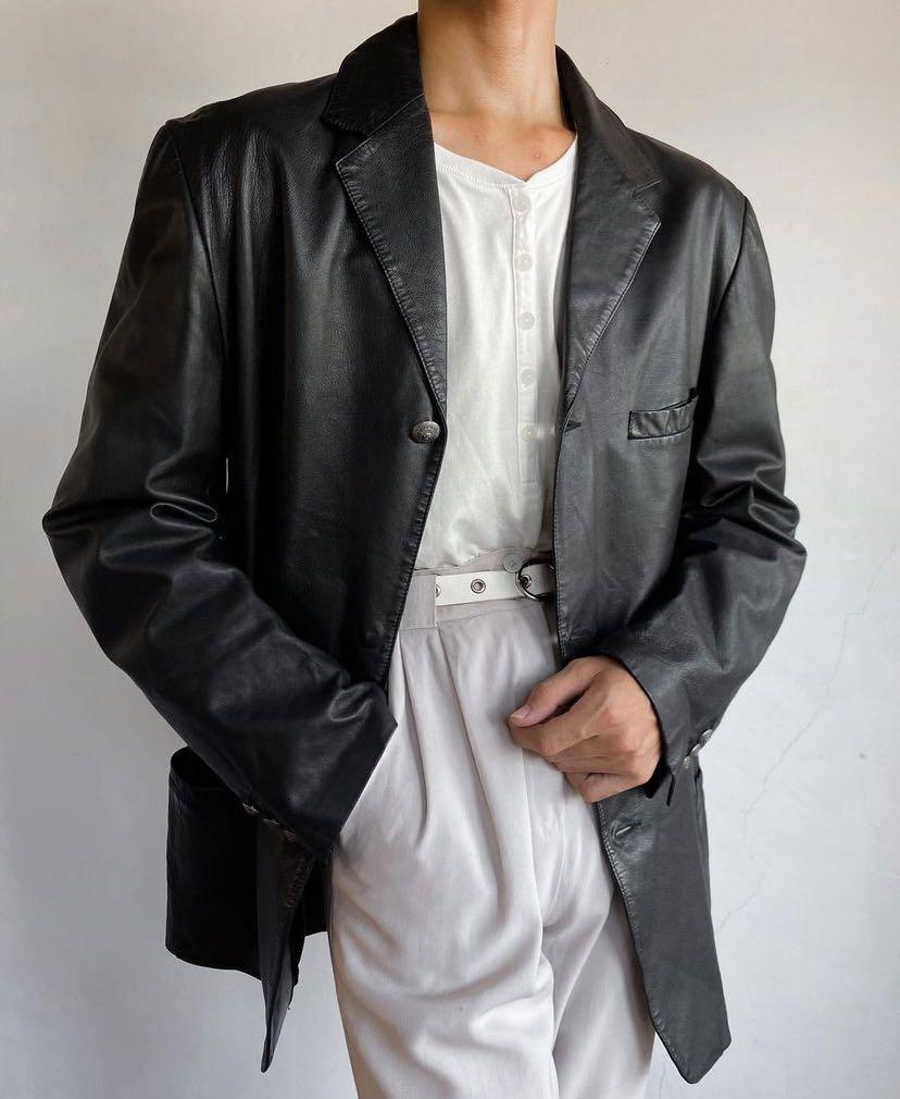 Vintage Versace Versus Leather Jacket (Category: Luxury Apparel) located in Cordon. Submitted by theclassic (Listing ID 1173469585, Image 2). Description: Truly Vintage Gianni Versace Versus Ittierre’ soft genuine oil butter leather jacket in stunning deep obsidian tone ft a classic notched collar lapel style structure and an incredible silver Medusa carved crest button closures. Three front essential pockets Tags and hologram sticker are still i