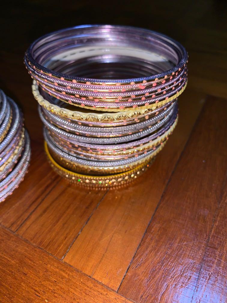 Assorted Bangles (Category: Other Accessories) located in Singapore. Submitted by seeeeet (Listing ID 1170084717, Image 2). Description: Assorted Bangles to be used on both arms. Used once for event. Everything for $10..