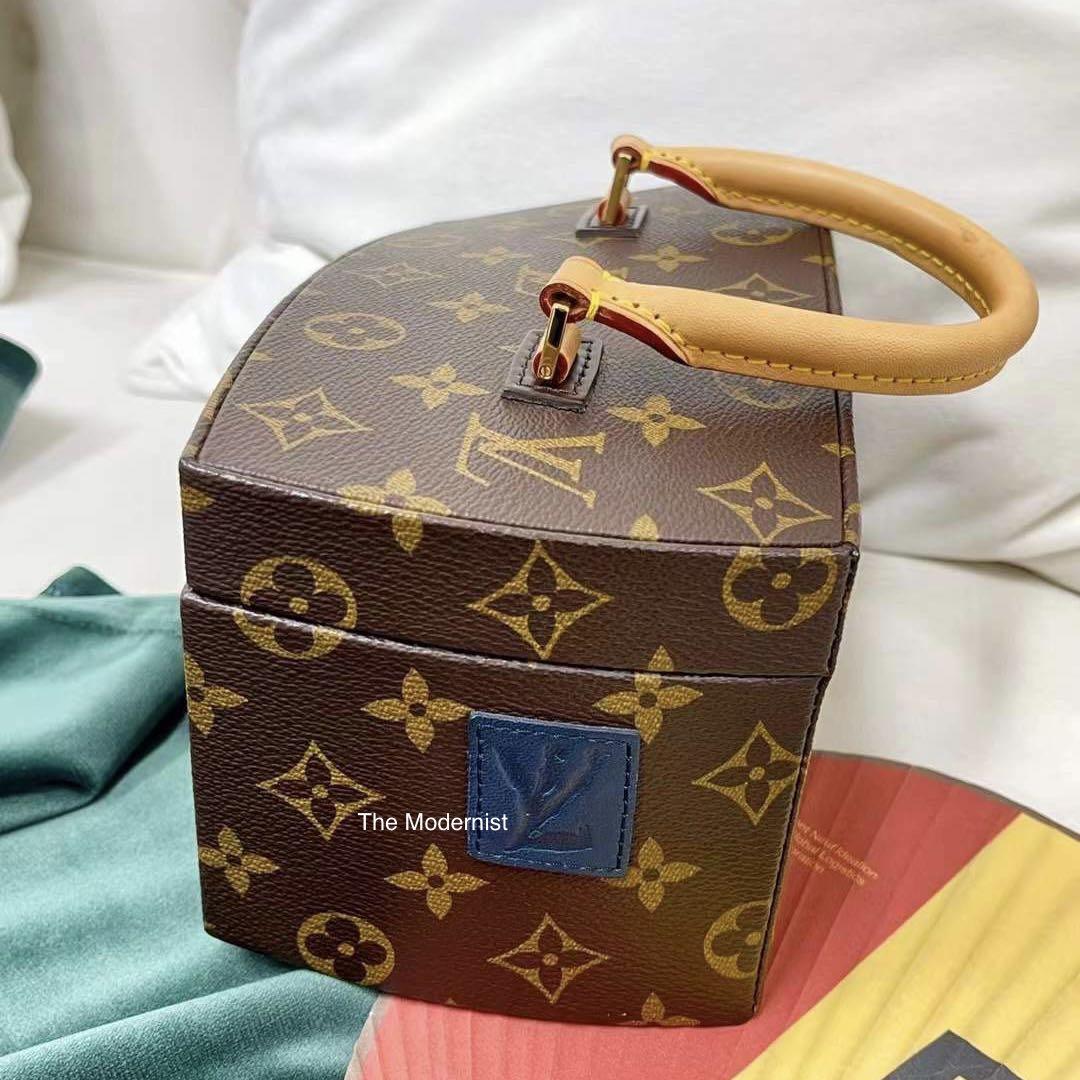 A LIMITED EDITION ICONOCLAST MONOGRAM CANVAS TWISTED BOX WITH GOLD HARDWARE  BY FRANK GEHRY, LOUIS VUITTON, 2015