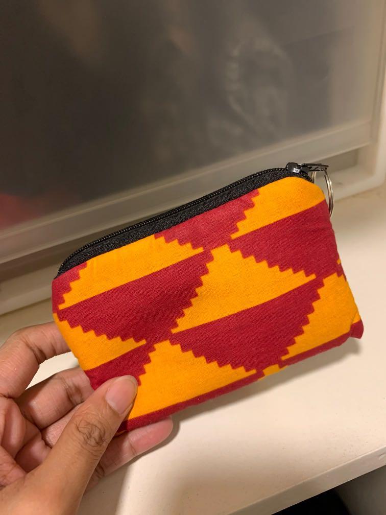 Coin pouch from Ghana, Africa, Women's Fashion, Bags & Wallets, Purses & Pouches on Carousell