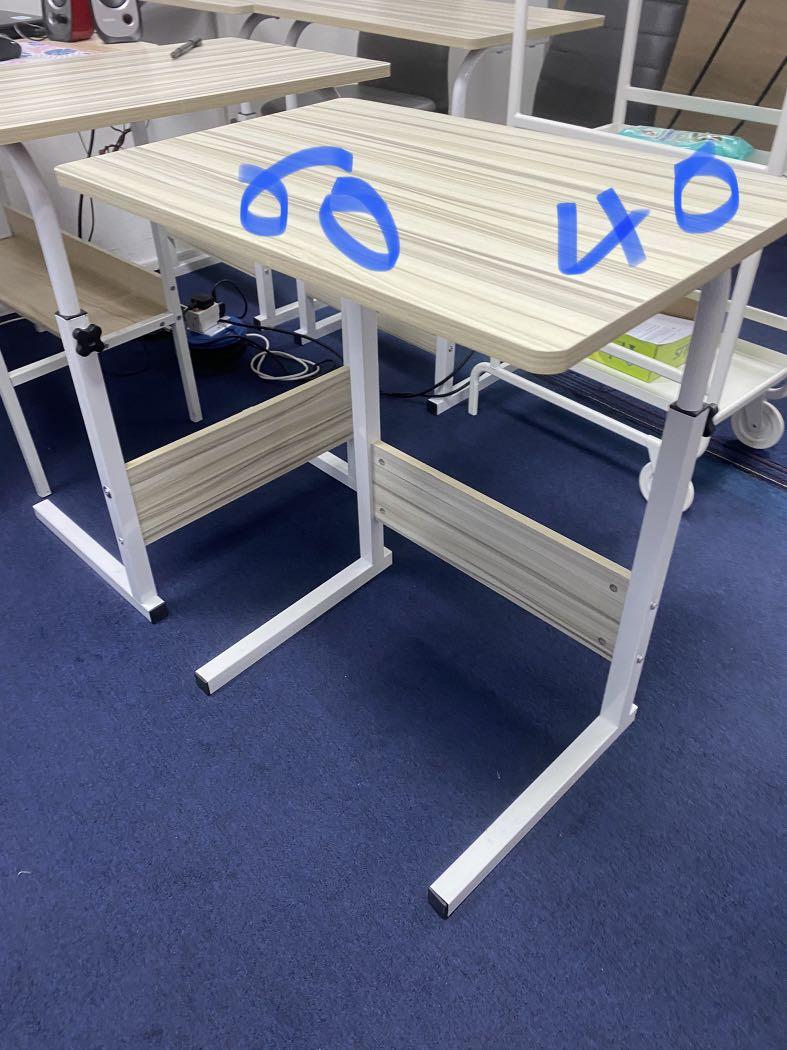Computer Table, study, laptop adjustable height (Category: Tables & Sets) located in Singapore. Submitted by hello_sg80 (Listing ID 1170137584, Image 2). Description: We’ve about 15-20pcs of this good condition like new tables to let go No wheels Please PM me to discuss Collection at Raffles area 60cm x 40cm No wheels .