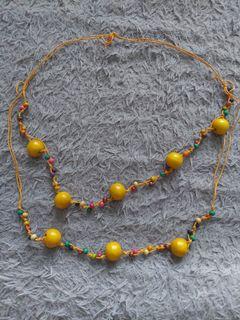 Kalung Bola Kayu Kuning