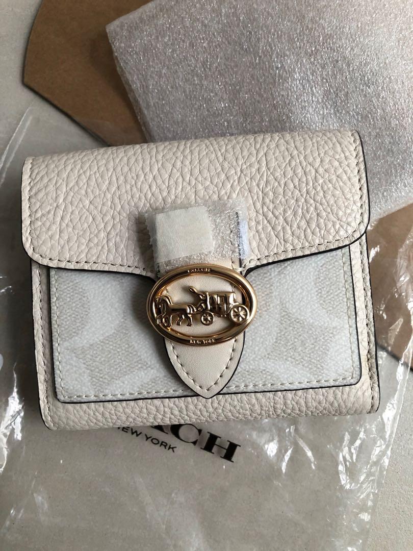 Coach - Georgie Bifold Wallet in White (Category: Luxury Bags & Wallets) located in Makati City. Submitted by matipati (Listing ID 1173633370, Image 3). Description: - Brand new - 100% original/authentic - Approx. 9 x 10.5cm - Bought from Coach, Canada - Original price $178 CAD (7,700+ in PHP) - Slightly negotiable .