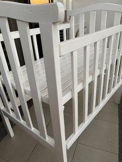 Wooden white crib