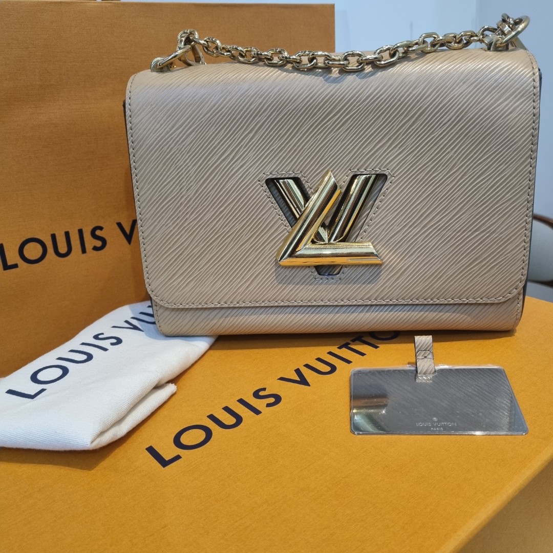LV Twist MM EPI Leather Pink SHW, Luxury, Bags & Wallets on Carousell