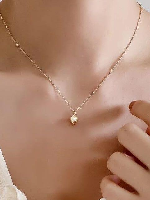 Gold chain with best sale heart pendant