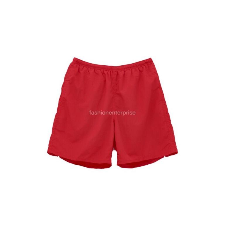 Supreme swim trunks fake clearance