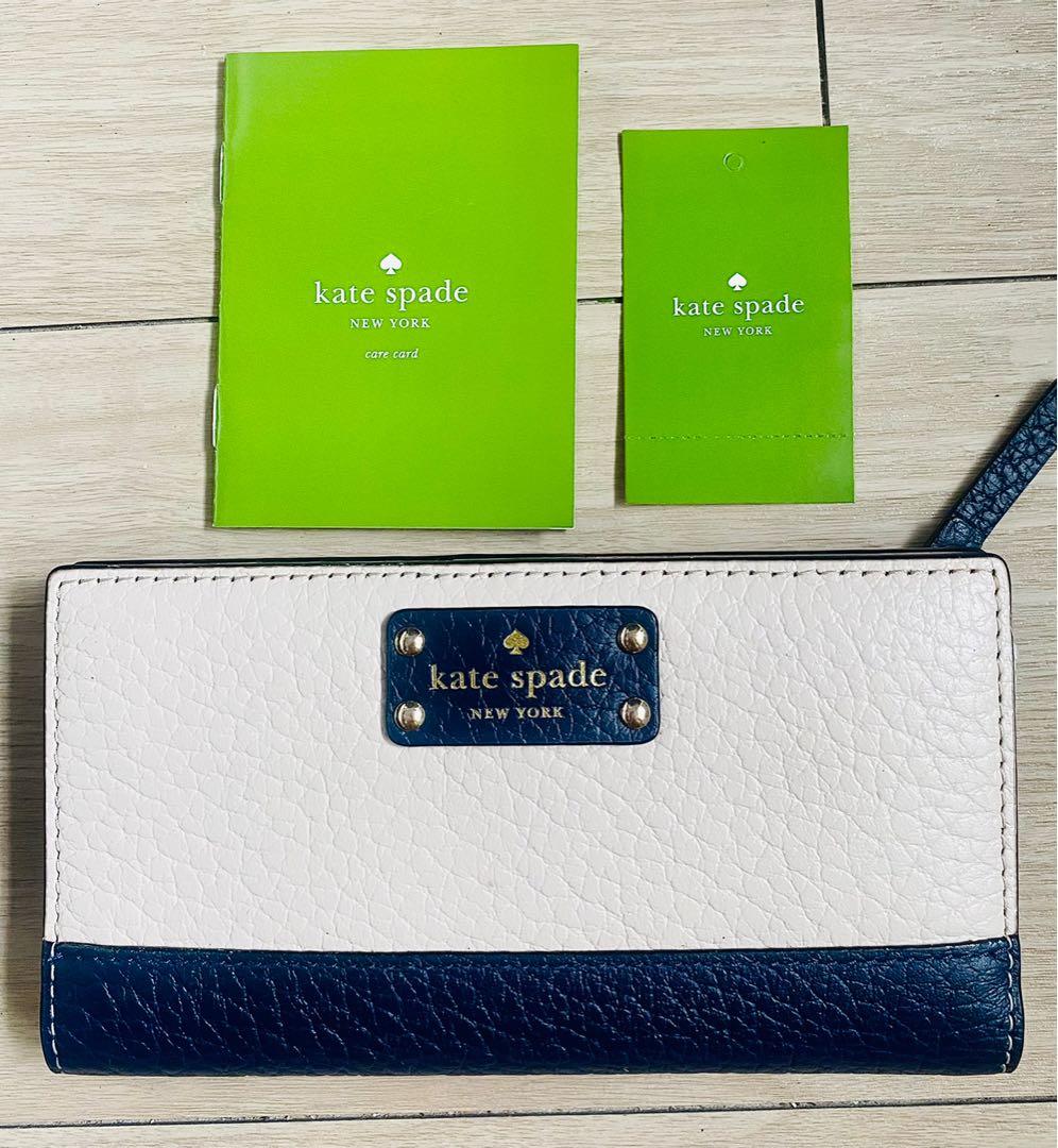 100% Authentic Kate Spade Kate Spade Bay Street Pbleofsre Cream and Navy  Blue Leather Bifold