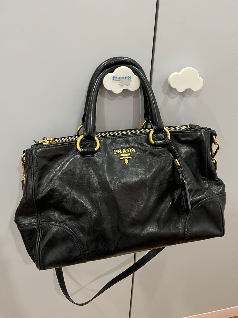 Prada black distressed leather bag, Women's Fashion, Bags & Wallets ...