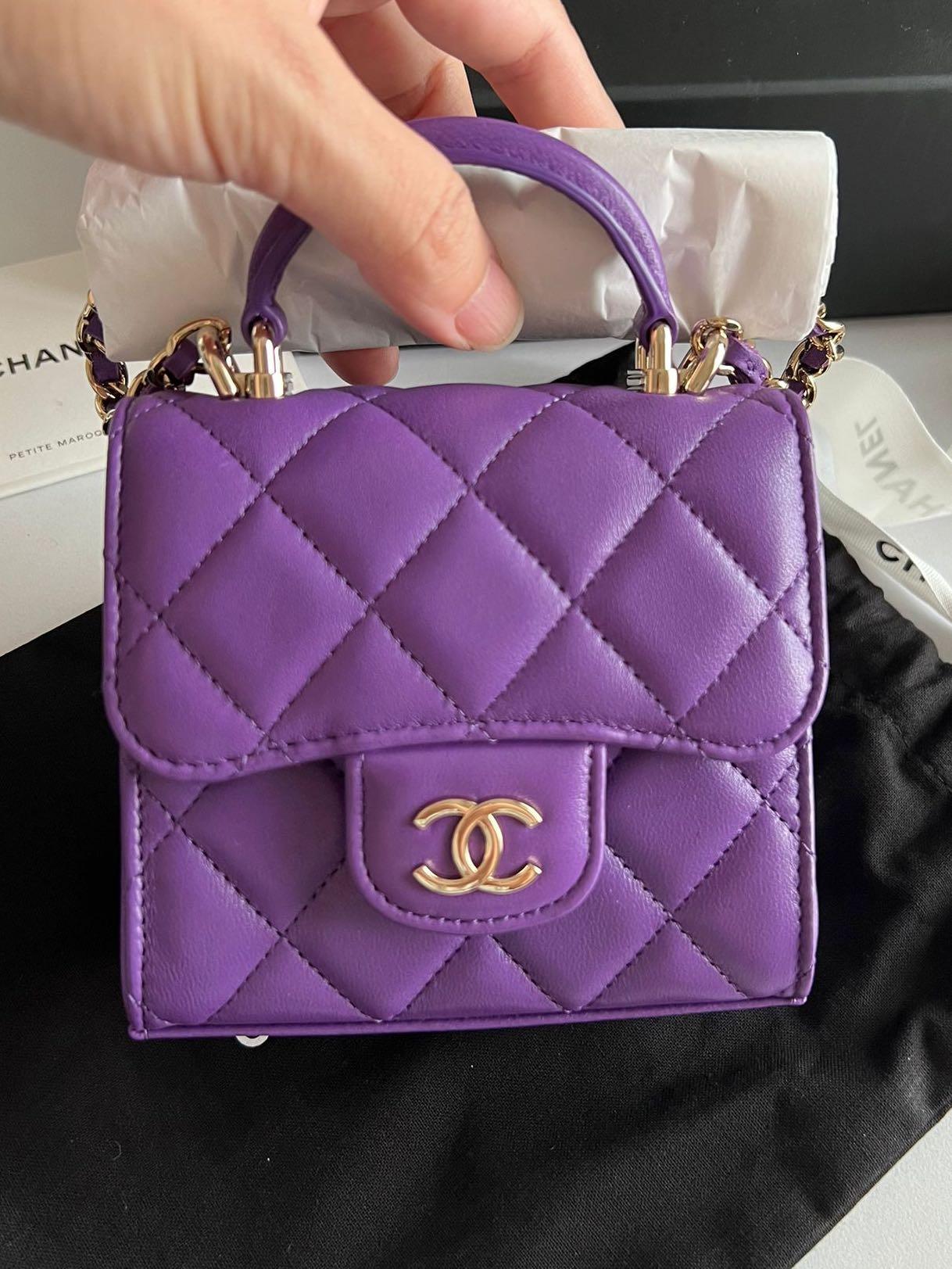 22A Chanel mini top handle clutch with chain, Luxury, Bags & Wallets on  Carousell
