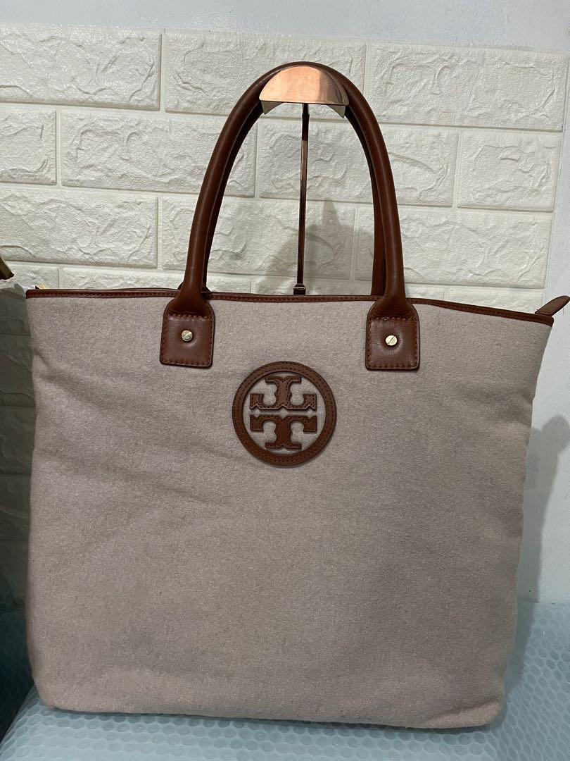 Authentic TORY BURCH Tote unique material Preloved (Category: Luxury Bags & Wallets) located in Calamba. Submitted by nibal (Listing ID 1174121992, Image 1). Description: Brand : TORY BURCH unique material Material: Not sure if ano tawag (pic 9&10) Condition: 9/10 Minimal Sign of usage in handle (pic 6) and rubber lining edge (pic 7) Some dirt inside This is a preloved / preowned bags, pls manage your expectation. .