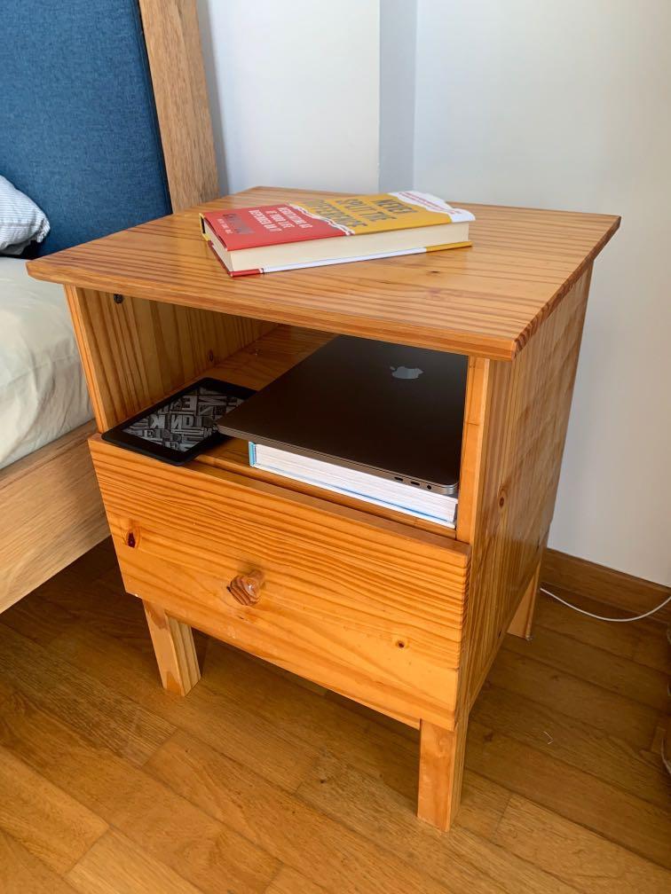 Bedside Table (Category: Shelves, Cabinets & Racks) located in Singapore. Submitted by nicebai (Listing ID 1174140427, Image 2). Description: Bedside table. Used for a few years, no defect and in good condition. We had this hand-varnished to make it last longer and look better from the original piece. Width: 48cm Height: 62cm Depth: 39cm .