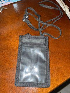 ID holder with pocket at the back