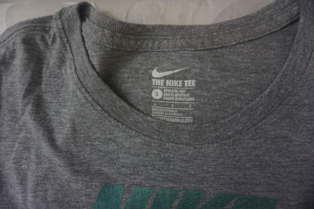 Nike grey t-shirt (Category: Tshirts & Polo Shirts ) located in Cainta. Submitted by gillianday (Listing ID 1174202475, Image 3). Description: Original Nike t-shirt Grey Large size for kids / Small-medium for women 100 php each / 2 t-shirts for 100 php Like new..