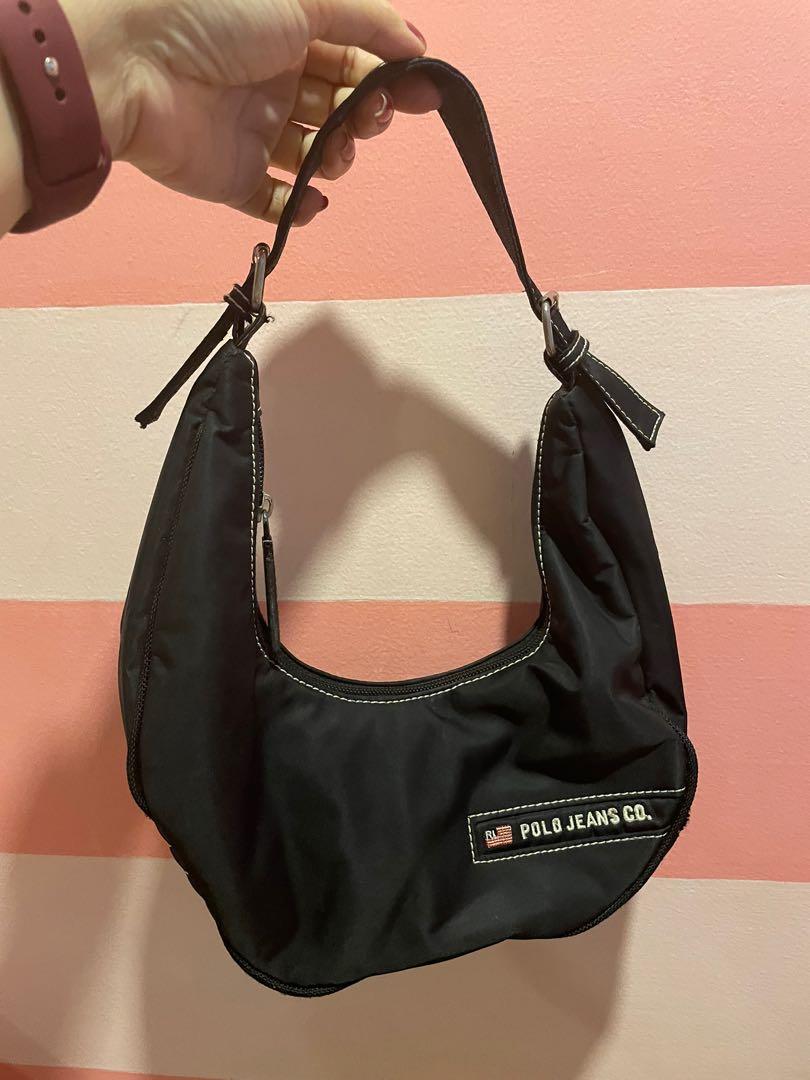 RL hobo small shoulder bag (Category: Luxury Bags & Wallets) located in Makati City. Submitted by jlohclaire (Listing ID 1174233388, Image 3). Description: Nylon material. Very light weight kili2 bag. Very spacious. Sale! Check the old price. .