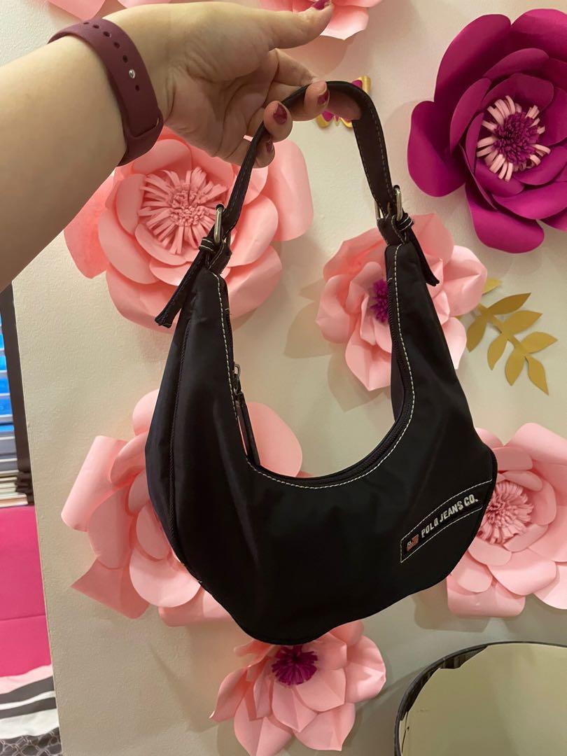 RL hobo small shoulder bag (Category: Luxury Bags & Wallets) located in Makati City. Submitted by jlohclaire (Listing ID 1174233388, Image 1). Description: Nylon material. Very light weight kili2 bag. Very spacious. Sale! Check the old price. .