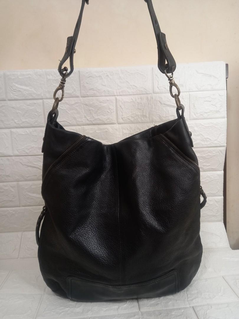 Status Anxiety Leather Hobo Bag (Category: Luxury Bags & Wallets) located in Las Pinas. Submitted by johnglennecat-13234 (Listing ID 1174140779, Image 1). Description: Pre-loved Status Anxiety Hobo Leather Shoulder Bag. Thick leather, with normal signs of usage please zoom in photos for reference and chat the seller for more detailed pic... Please manage your expectations. All sales final. Kindly examine pictures carefully when buying online. No 