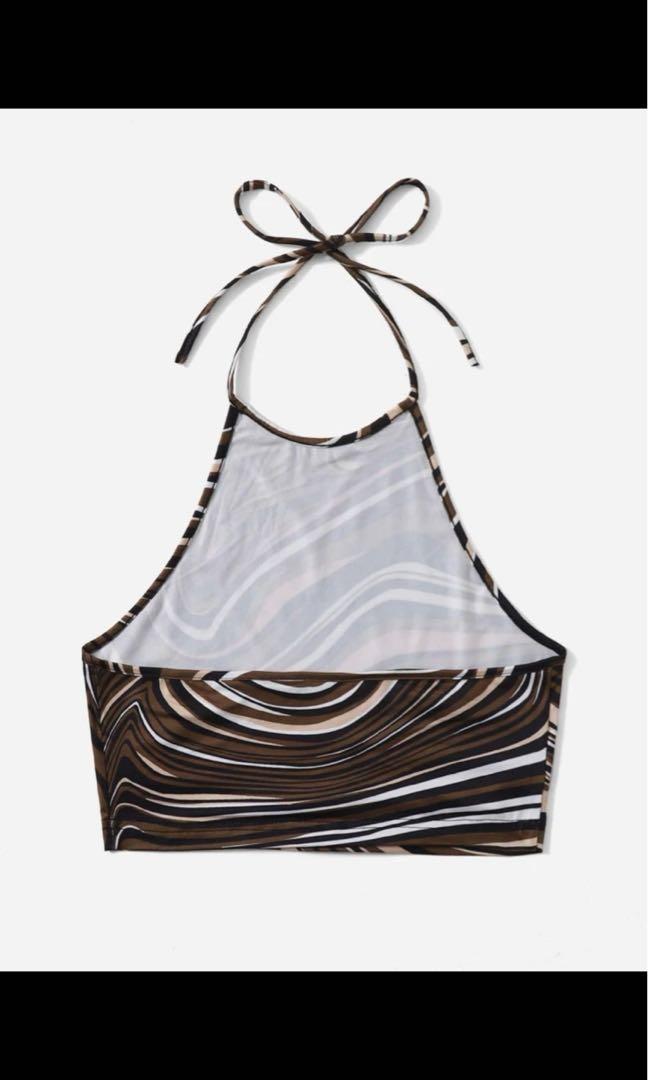 Brand new shein halter top (Category: Sleeveless) located in Mandaluyong City. Submitted by tkbuys (Listing ID 1174497478, Image 2). Description: Bought this halter top from shein and never been used :).