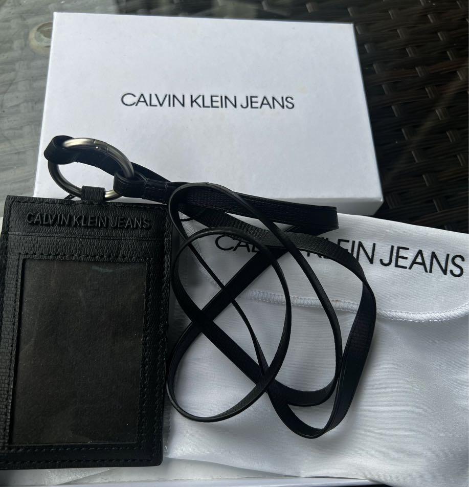 Calvin Klein Jeans lanyard, Women's Fashion, Bags & Wallets, Wallets & Card  Holders on Carousell