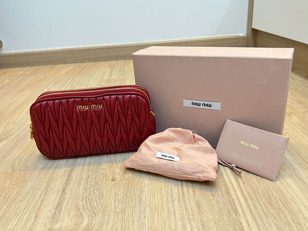 Miu Miu Matelasse Double Zip Sling Bag Clutch Women s Fashion Bags Wallets Shoulder Bags on Carousell