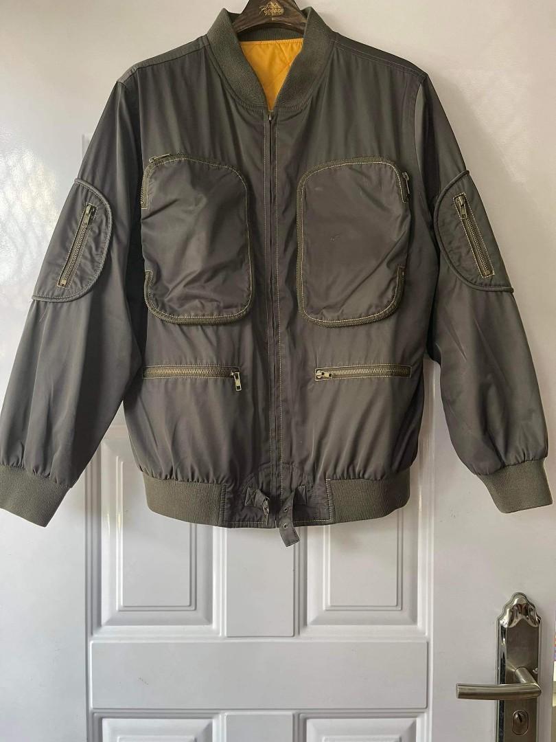 Multi pocket military/tactical jacket (MADE IN JAPAN) (Category: Coats, Jackets and Outerwear) located in Manila. Submitted by furugi24 (Listing ID 1174336074, Image 1). Description: Multi pocket bomber jacket Medium - large Excellent Issue broken zipper handle 1500.