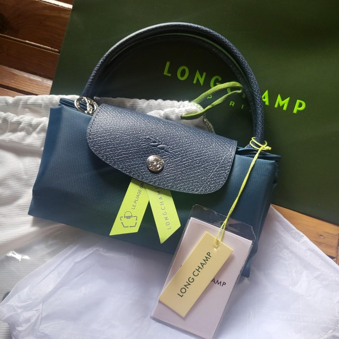 Longchamp Le Pliage Collection Clutch, Luxury, Bags & Wallets on Carousell