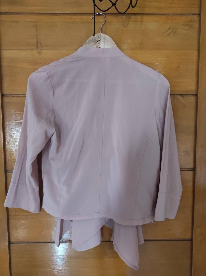 Cardigan (Category: Coats, Jackets and Outerwear) located in Quezon City. Submitted by tsktsktskk (Listing ID 1174526570, Image 2). Description: Cardigan in peach color (please check the third photo for a more accurate color of the cloth). Only worn once or twice. Will probably fit small to medium. RFS: Decluttering .