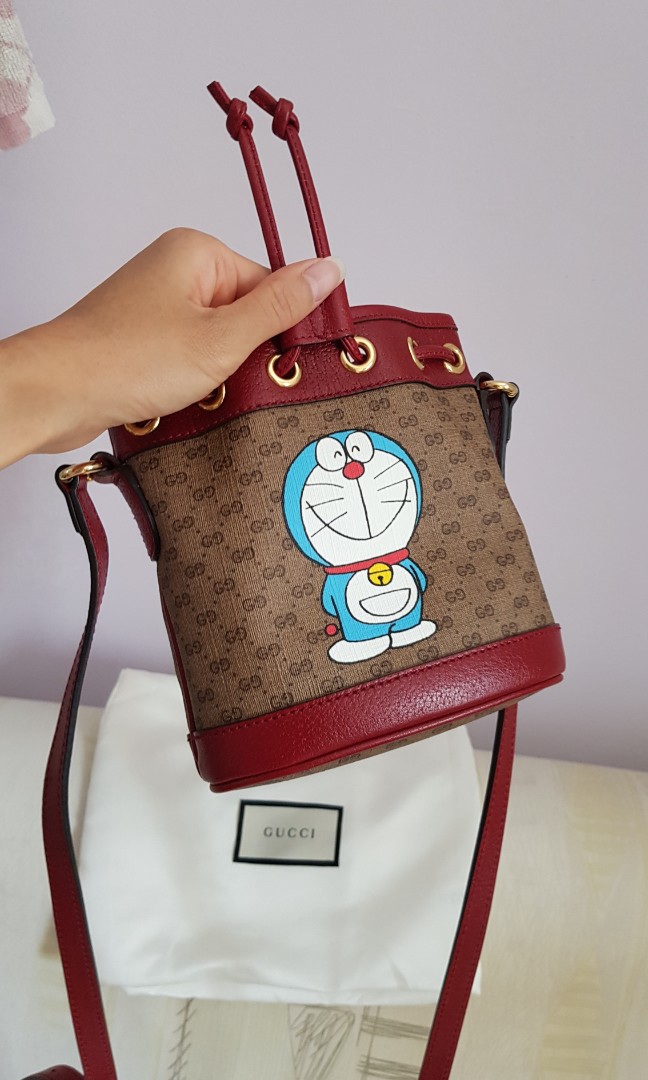 Gucci X Doraemon Micro GG Canvas Mini Bucket Bag (SHF-23730) – LuxeDH