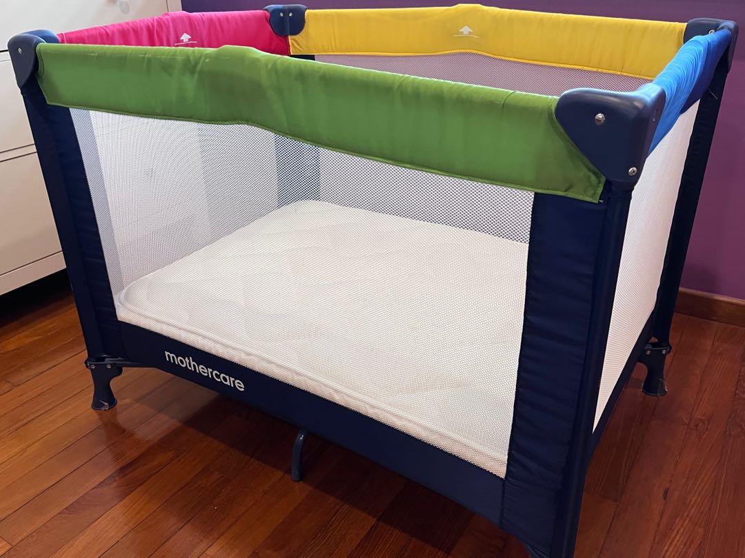 Mothercare colour block travel outlet cot