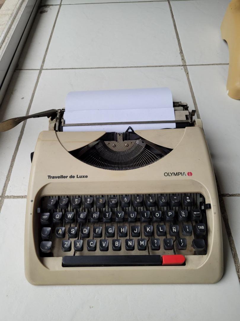 OLYMPIA Traveller Deluxe Manual Typewriter (Category: Stationery & School Supplies) located in Muntinlupa City. Submitted by havilahph (Listing ID 1174536321, Image 1). Description: Portable, light and with case! Good working condition! With working case! Great for restaurant or coffeeshop vintage/nostalgic display Or those who just still want to use typewriters - here's a great buy! At only Php 8500, just for you. ;).