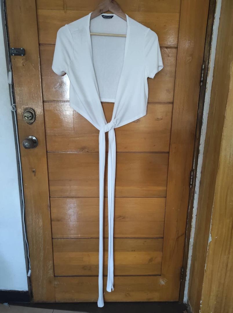 Shein wrap blouse (white) (Category: Blouses) located in Quezon City. Submitted by tsktsktskk (Listing ID 1174525422, Image 2). Description: Shein wrap blouse (large), never worn RFS: Decluttering.