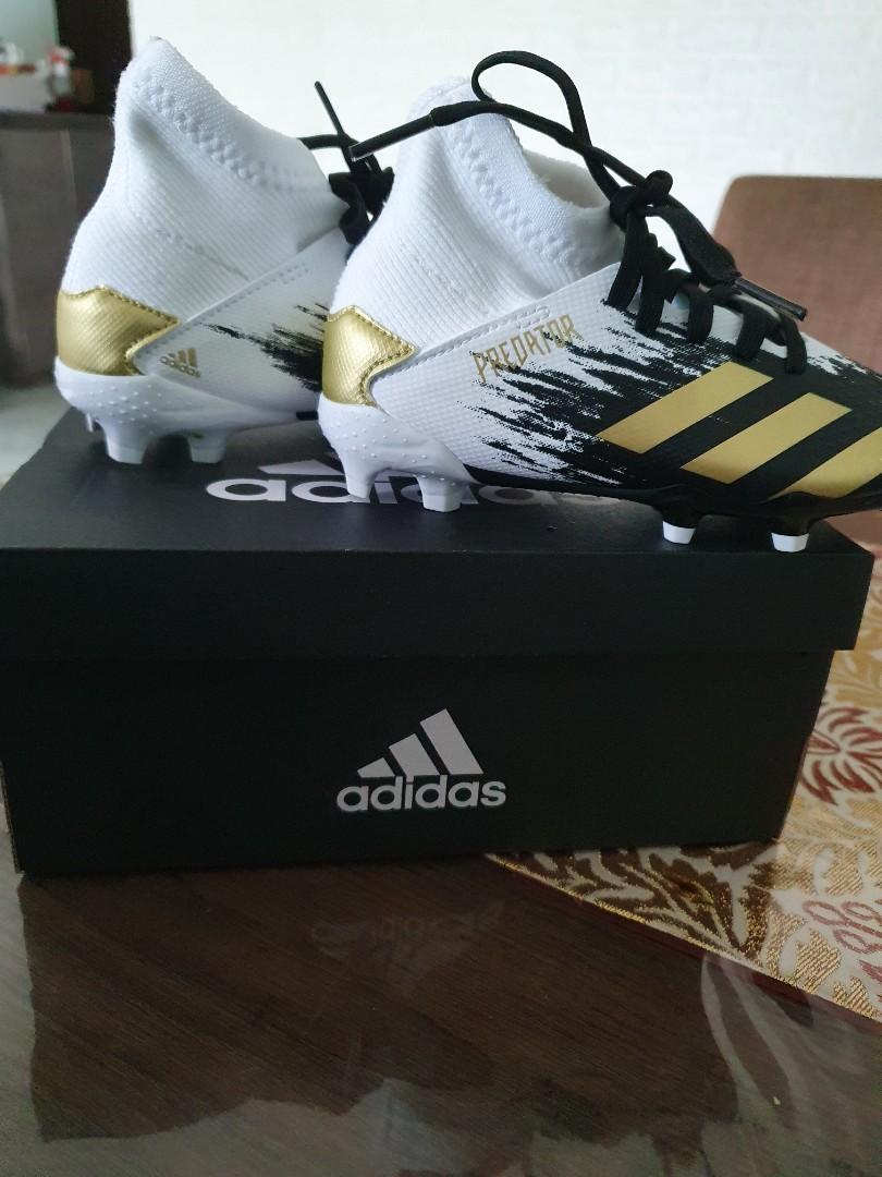 Gold boys sales football boots