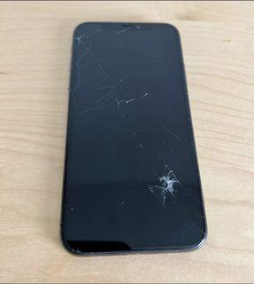 iphone x with crack on front screen