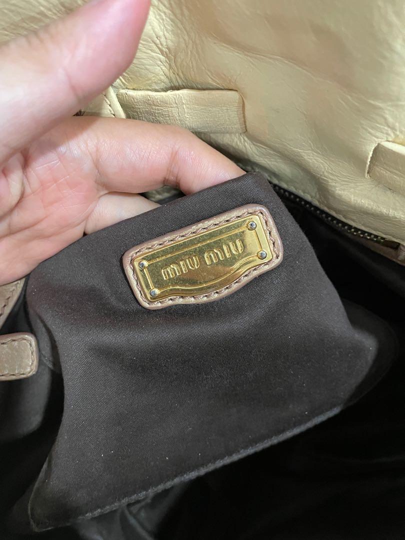 Fake miu miu best sale bag