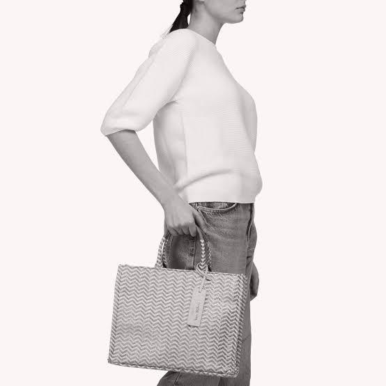 Coccinelle Never Without Bag / Jacquard Tote (Category: Luxury Bags & Wallets) located in Pasig City. Submitted by luxebagcray (Listing ID 1175083704, Image 2). Description: Super chic and roomy jacquard tote a la Dior Book Tote - great for casual style/beach/road trips Size medium - spacious without overwhelming small frames With bag tag and cards RFS: Spring cleaning Used only once! Still retails at 200+ USD so this is a steal.
