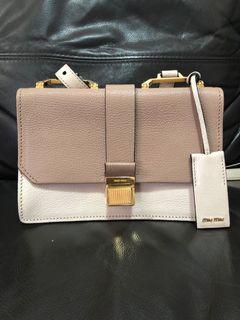 Miu Miu Bow mini bag, Luxury, Bags & Wallets on Carousell