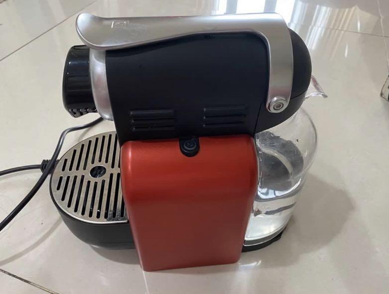 Nespresso x Delonghi Essenza Automatic Coffee Machine (Category: Coffee Machines & Makers) located in Manila. Submitted by shopwithbrilliantadel (Listing ID 1174953779, Image 2). Description: works perfectly fine rarely used regularly descaled no issue except for scratches due to usage.