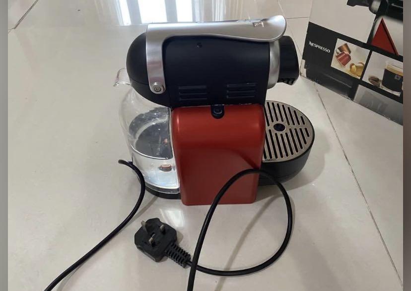 Nespresso x Delonghi Essenza Automatic Coffee Machine (Category: Coffee Machines & Makers) located in Manila. Submitted by shopwithbrilliantadel (Listing ID 1174953779, Image 1). Description: works perfectly fine rarely used regularly descaled no issue except for scratches due to usage.